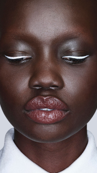 Model wearing white eyeliner