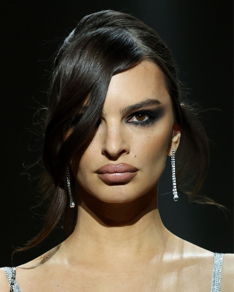 Closeup of Emily Ratajkowski with livedin smoky eye makeup.