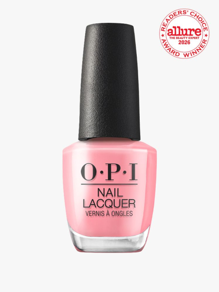 Bottle of pink OPI Nail Lacquer on white background