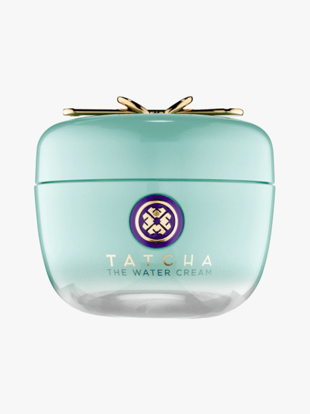 Tatcha The Water Cream Moisturizer aqua green jar with gold bow on top on light gray background